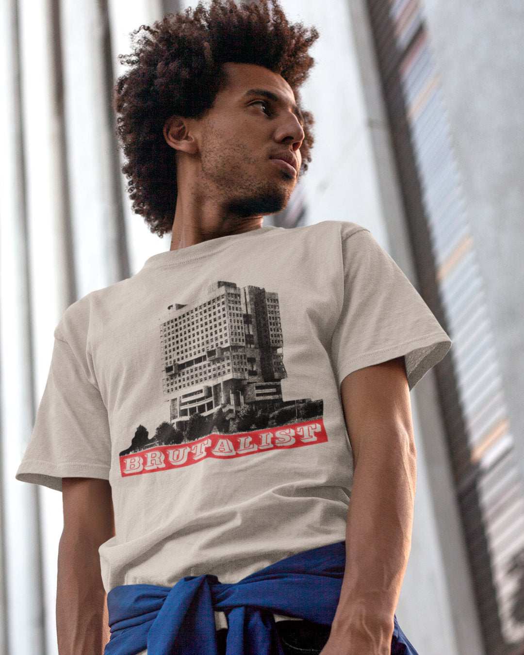 T-shirt with a graphic of a building and the word 'BRUTALIST' on a white background