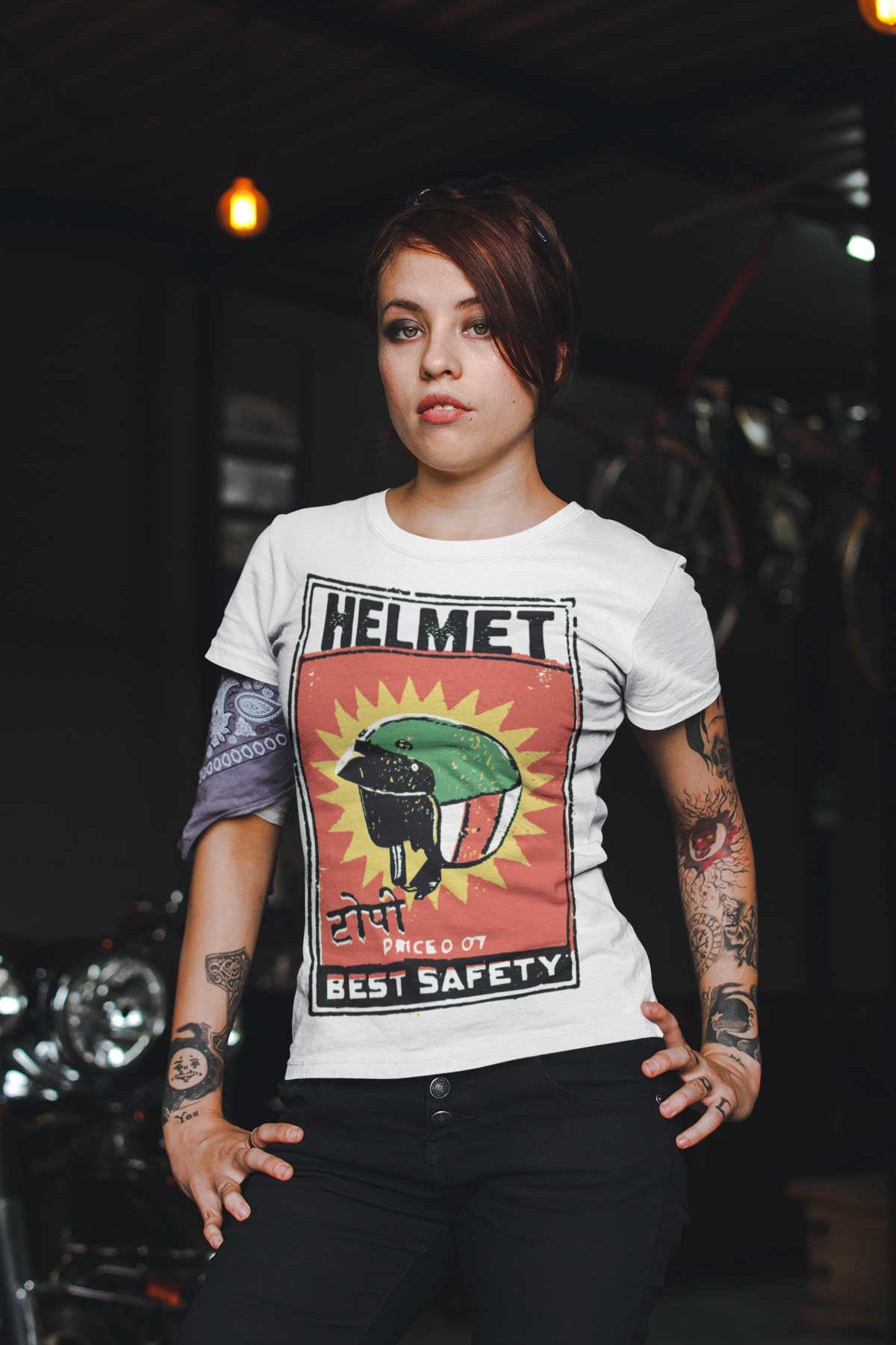 woman wearing a t-shirt with motorcycle helmet graphic