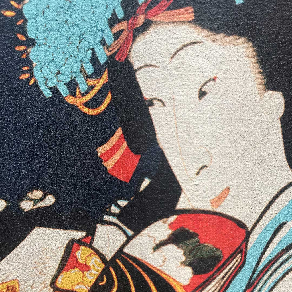 Traditional Japanese artwork of a person holding a fan with intricate details.