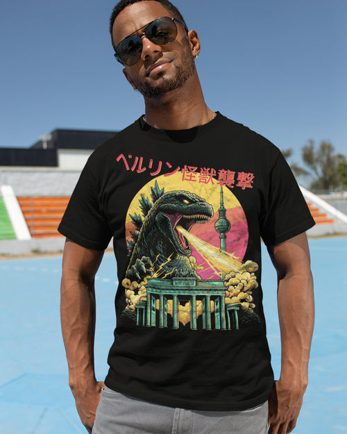 Man wearing a black graphic t-shirt featuring a giant kaiju against the berlin skyline