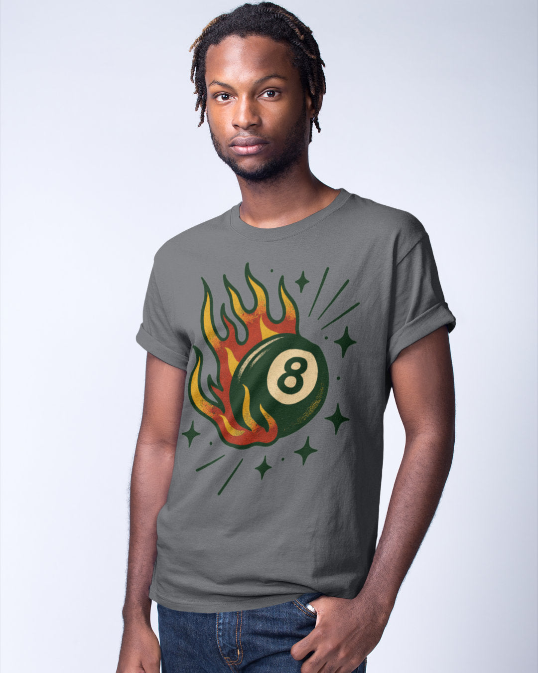 Man wearing a gray t-shirt with a colorful design of a flaming eight-ball.