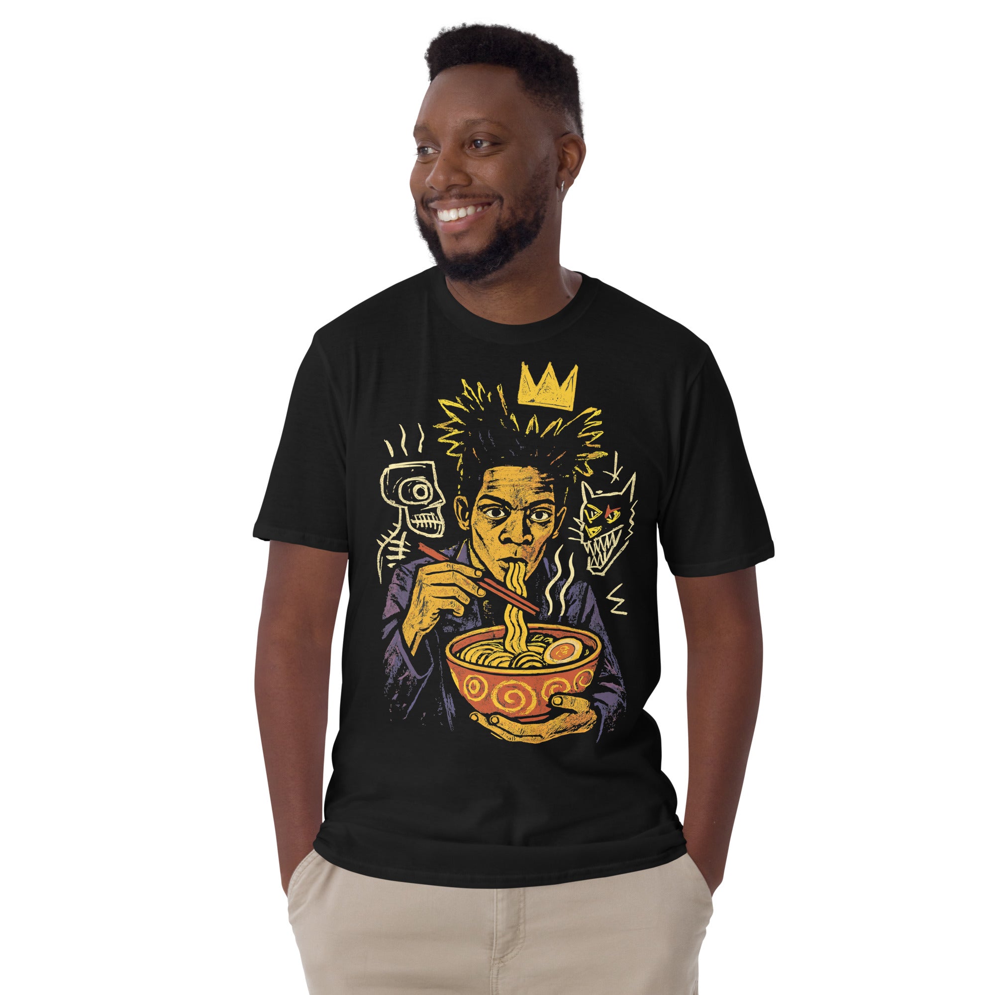 Man wearing a black t-shirt with a graphic design of a person eating noodles, on a white background.