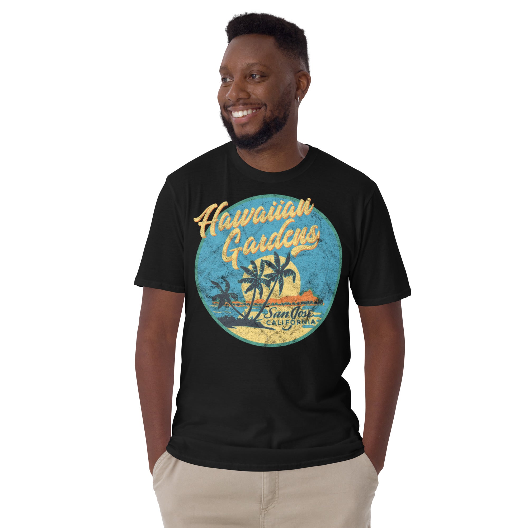 man wearing a black hawaiian gardens t-shirt