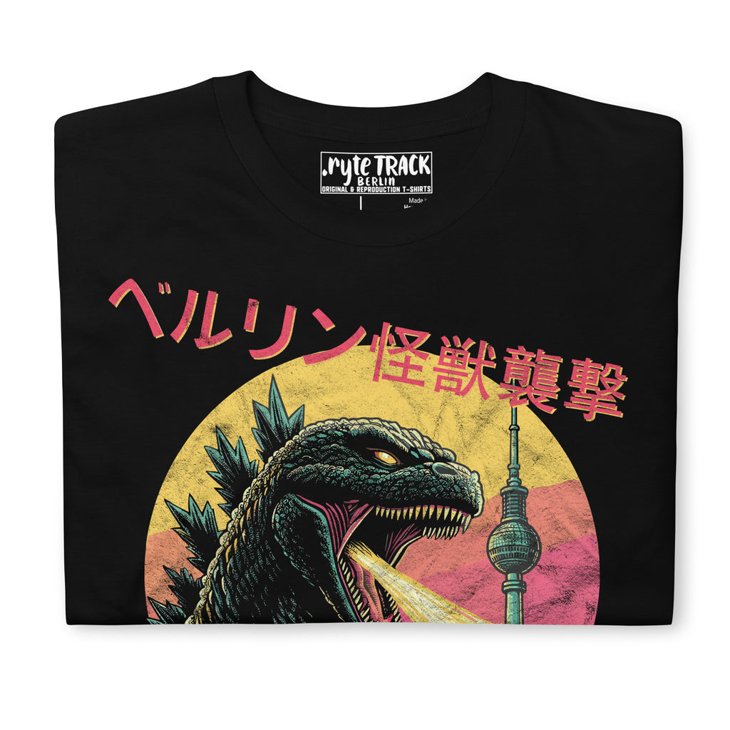 Detail of a black graphic t-shirt  of a giant kaiju against the Berlin skyline