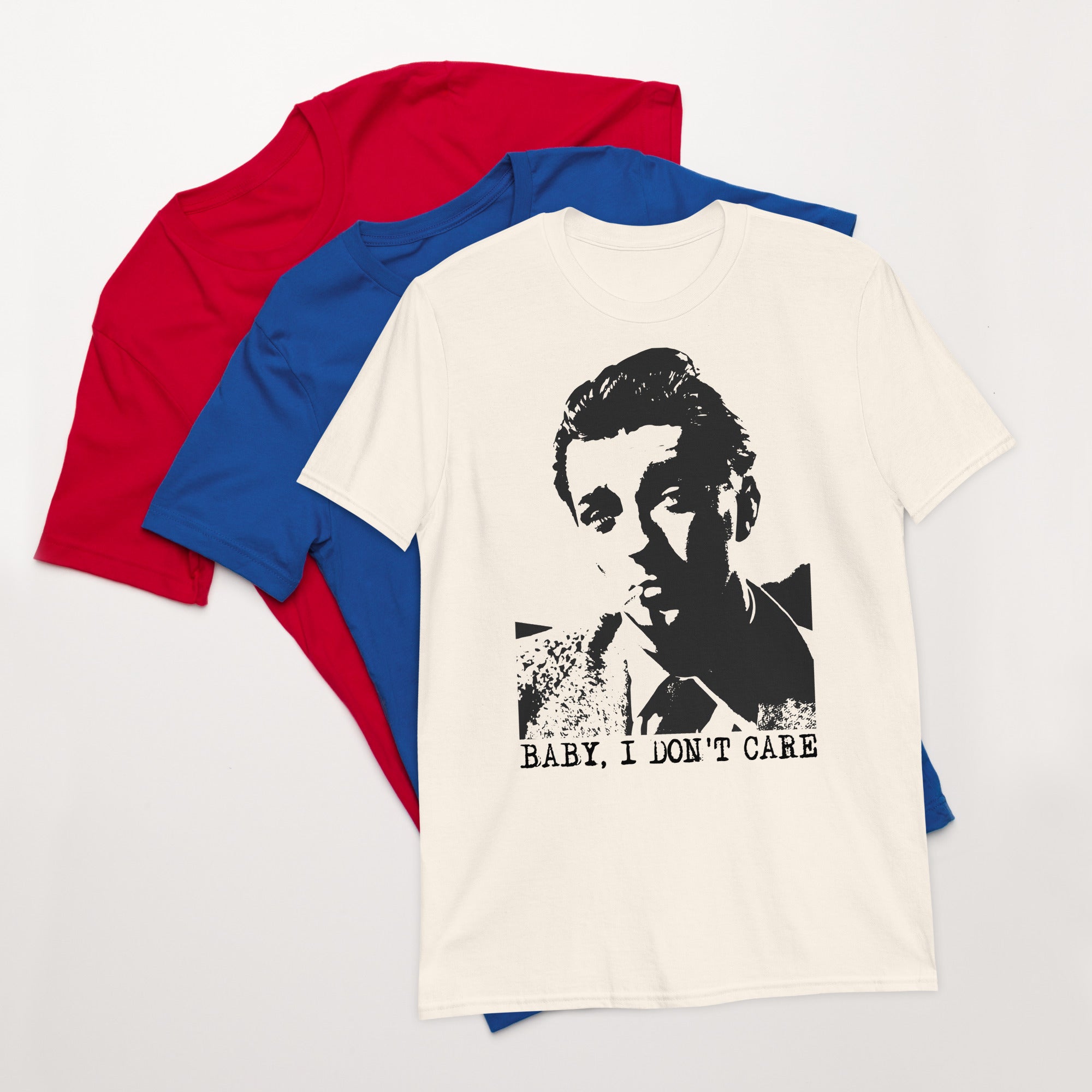 three t-shirts including one with an image of Robert Mitchum