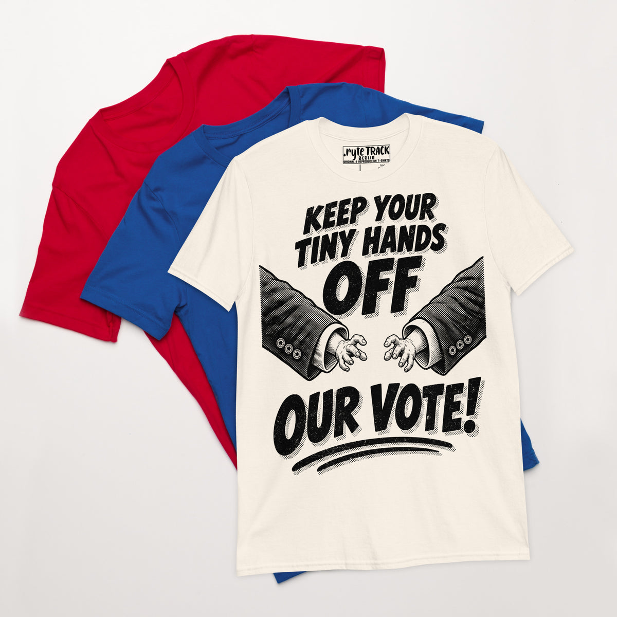 pile of t-shirts with protest graphic tee on top