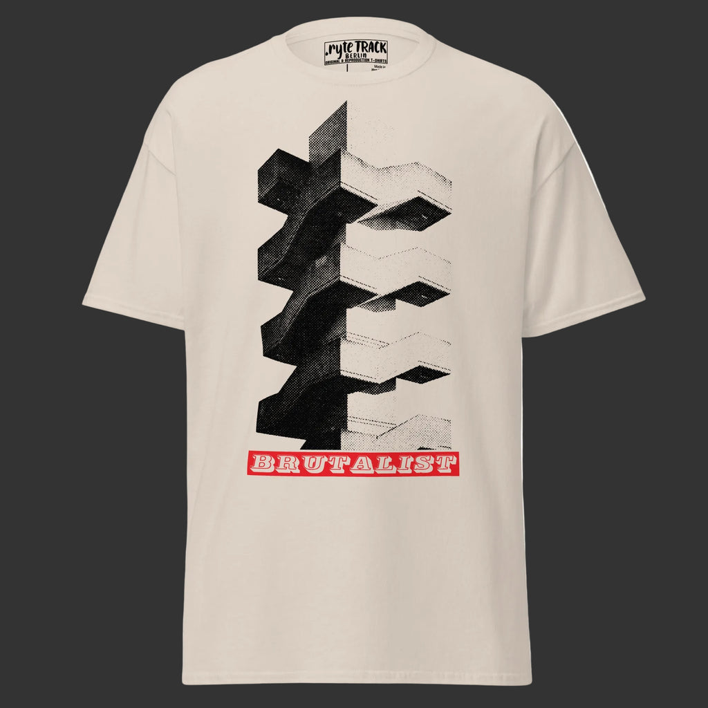 A beige short-sleeve t-shirt with a large graphic print of Brutalist architecture in black and white, featuring a red banner with the word 'BRUTALIST' at the bottom. The brand 'Ryte TRACK' is visible on the inner neck label.