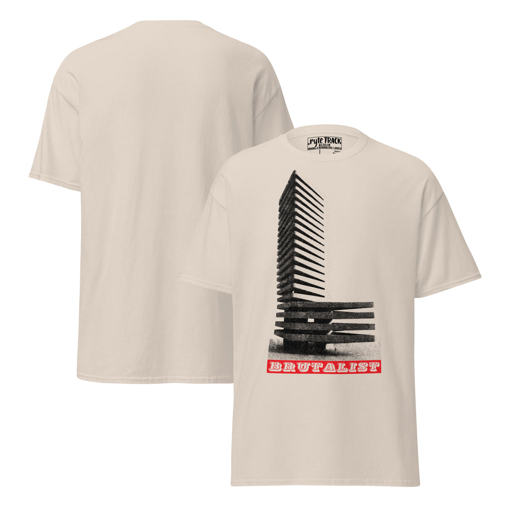 A light beige short-sleeve t-shirt shown from both front and back. The front features a black graphic of stacked wooden pallets forming a tower, with a red banner at the bottom containing white text.